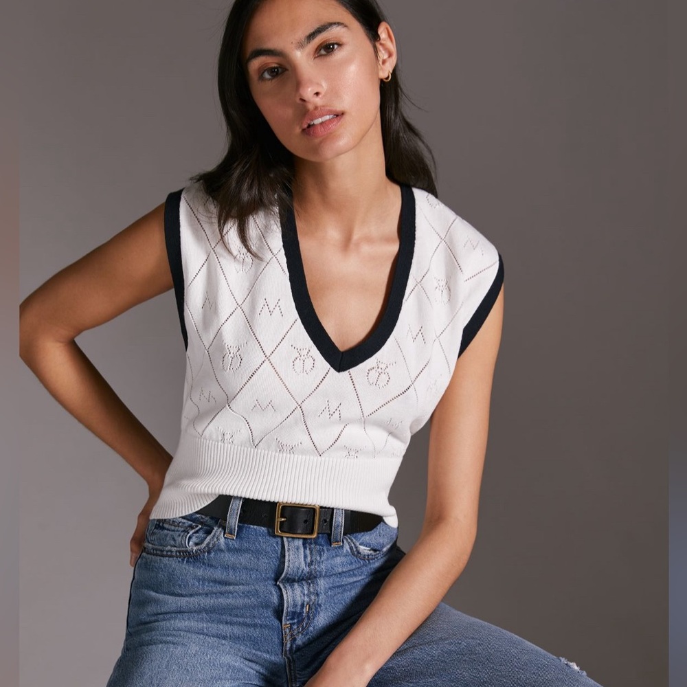 Maeve Anthropologie violette icon logo vest